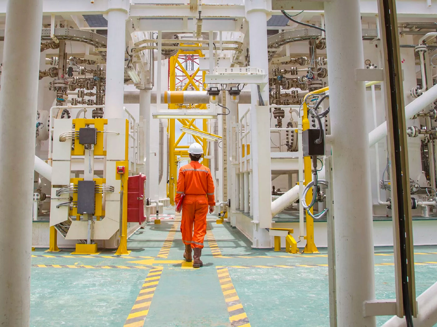 industrial facility with person walking